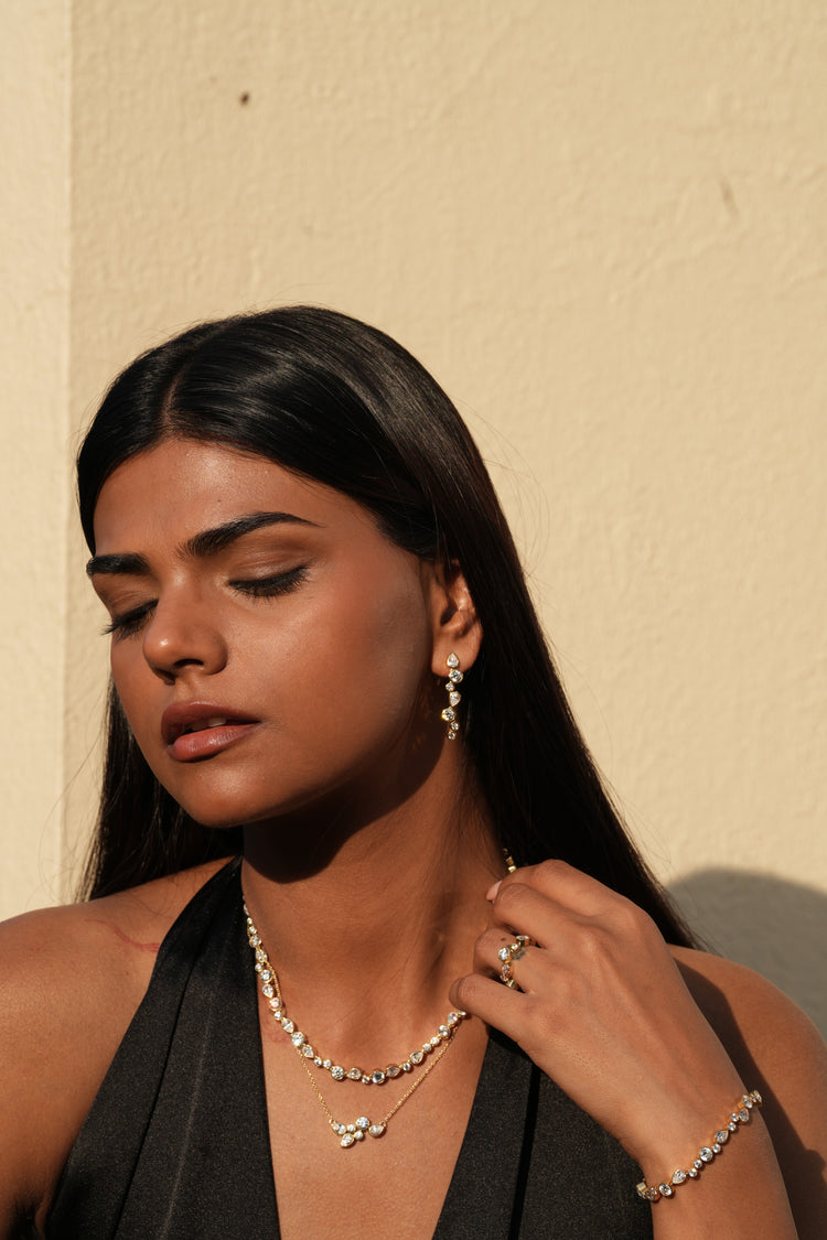 The Sequence Drop Earrings worn by model (PRA02736)
