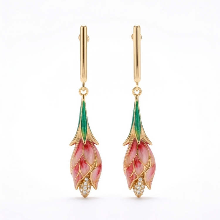 Gold earrings with floral design on a white background