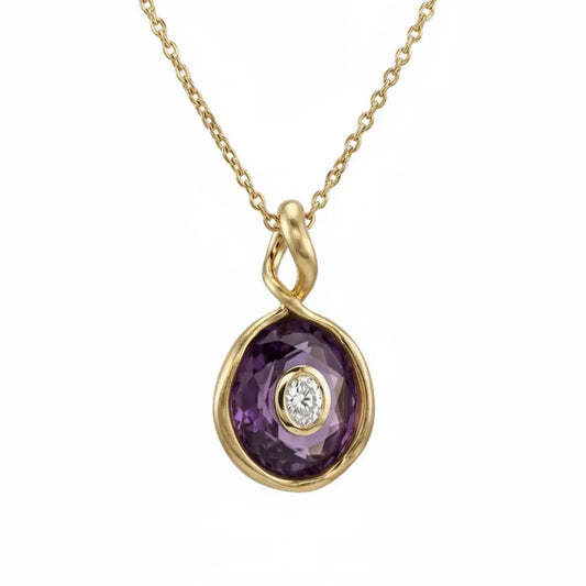 Gold necklace with a purple gemstone pendant on a white background